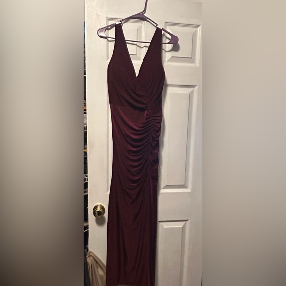 DB Studios bridesmaid dress. Form fitting with rouching on the side and a slit. - Picture 1 of 3